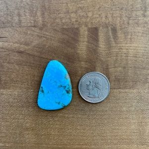 Turquoise Cabochon set in Leather Service